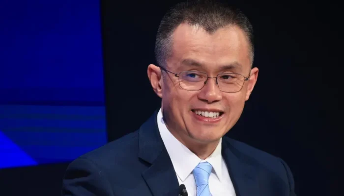 Portrait of Changpeng Zhao highlighting his rise in global wealth rankings above Bill Gates