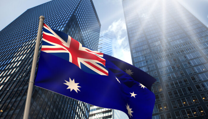 Australian flag with crypto icons representing new custody regulations for digital assets