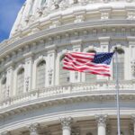 An illustration featuring the U.S. Capitol, the White House, cryptocurrency symbols, blockchain graphics, and policy documents representing the CLARITY Act and proposed crypto ethics rules.