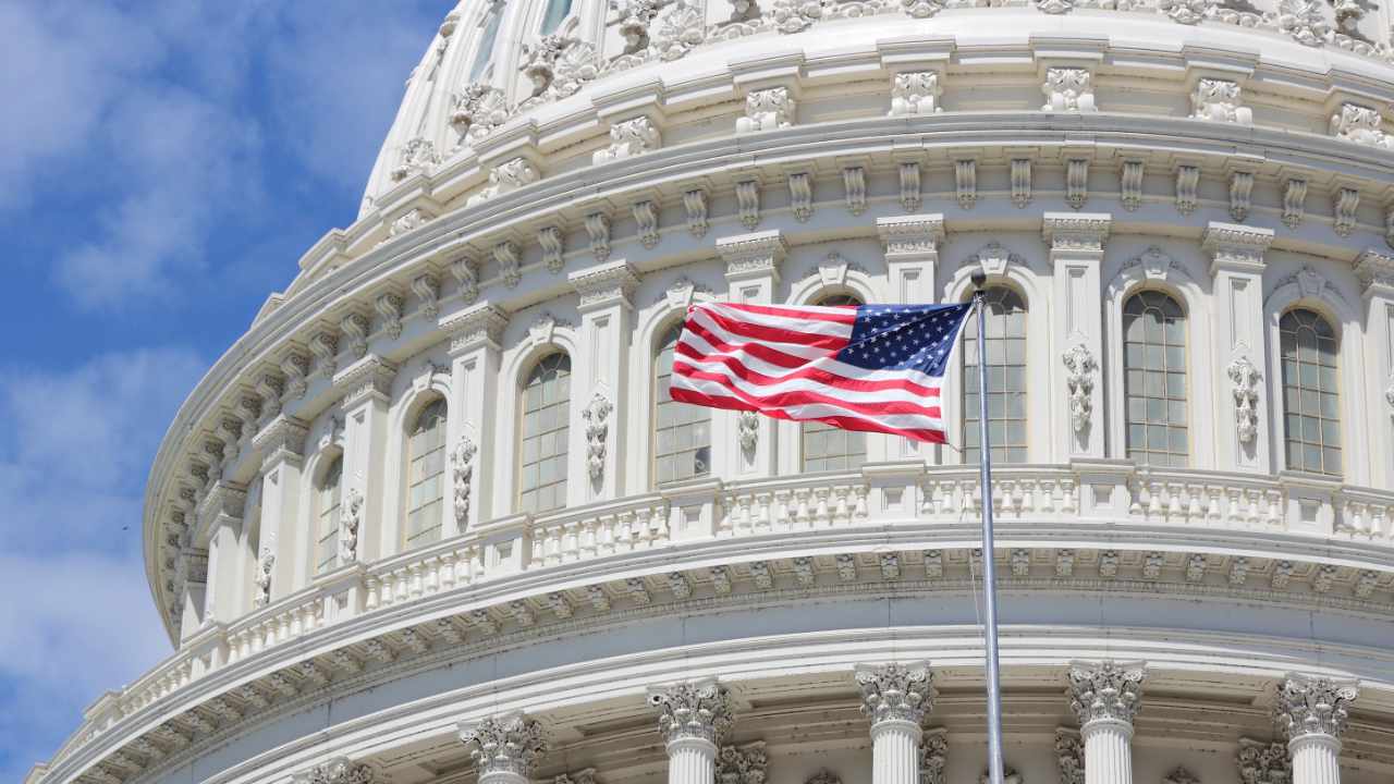 An illustration featuring the U.S. Capitol, the White House, cryptocurrency symbols, blockchain graphics, and policy documents representing the CLARITY Act and proposed crypto ethics rules.
