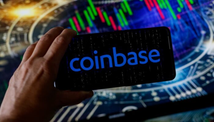 Coinbase logo with UK financial district, regulatory approval documents, and digital finance graphics representing the company's UK licence expansion