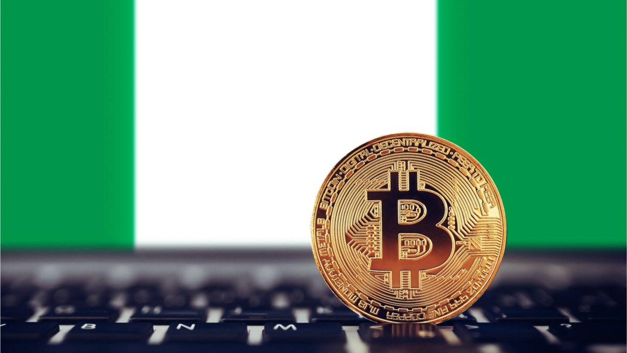 A smartphone displaying a cryptocurrency trading app alongside a Nigerian Tax Identification Number (TIN) document, illustrating Nigeria's new tax rule for crypto accounts.